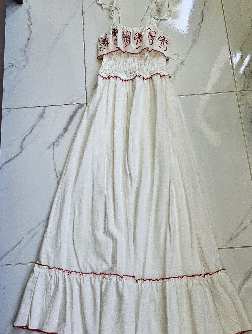 White maxi dress with red embroidery